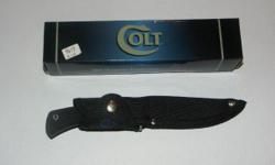 Colt Trailscout Hunter. 8 1/8" overall. 4" 420 J2 stainless blade. Black rubber handle with a checkered grip and stainless finger guard. Lanyard hole. Black nylon belt sheath. Payment to be via PayPal. Buyer to pay actual shipping charges. Item may be