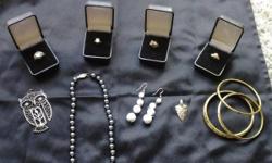 1 silver toned ring size 7, 3 gold toned rings size 5, 1 fake black pearl necklace, 1 set white earrings, 1 owl necklace pendant, 1 arrowhead necklace pendant, 3 set of gold toned bracelets. Message me for more pictures or with questions.