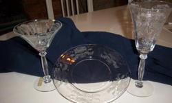 Tiffin Flanders stemware and salad plates. Clear glass, no color. 10 of each: plate, water glass and martini glass. Selling at a very reduced price. Would like to sell, making room in my home. Like new, used twice. Antique dealers welcome. See pictures