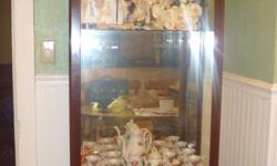 CHERRY CURIO CABINET, CHERRY WOOD WITH 3 GLASS SHELVES, LITE UP... NO SCRATCHES, VERY NICE, NEED THE MONEY...PLEASE CALL 903-793-4565 OR E-MAIL trishwaynick@comcast.net or call 903-793-4565. thanks and be blessed.