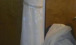 Beautiful wedding dress for sale asking for $300. It's a size 8 and in a smoke free home.