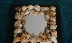 DECORATIVE SEA SHELL MIRROR WALL HANGING, MEASURES: 16X16"..........SHIPPING AVALIABLE......