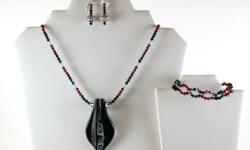 $68.00
Materials: Sterling Silver, Swarovski Crystals, Glass Pendant
http://www.etsy.com/listing/69871817/deep-red-and-jet-black-crystal-necklace
Necklace Details:
Length: 20.5" (52cm)
Pendant Length: 2.5" (6.5cm)
Toggle Clasp
This listing is for the