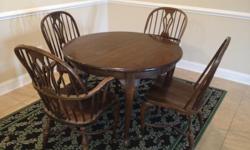 Solid wood 44" round kitchen table
4 chairs (2 with arms)
Leaf to extend table included