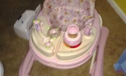 Lights up pink Disney walker with a feeding tray
