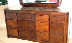 Ashley solid Cherrywood dresser with 9 drawers (top drawers are cherrywood with bottoms black velvet lined), stone top, large cherrywood framed beveled mirror. Dresser is: 72" long x 21" deep x 36" high.
Framed Cherrywood Mirror is 50" x 42"
Pristine