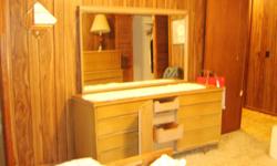 Large tripple dresser with mirror and matching chest of drawers. Condition good.