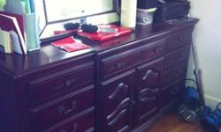 Large 12 drawer dresser with detachable mirror. Its fairly new and great shape! Measures around 6.5 feet long