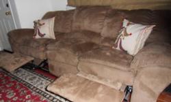 Very clean, and almost new dual reclining microfiber sofa in beige for sale. It is coming from a very clean, pet free environment. No stains. Call Neil at (858)361-0746.