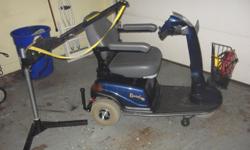 electric scooter Rascal 600 - 2 baskets, adjustable seat, alarm system, like new
