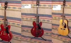 THree Epiphone guitars in excellent condition:
Red Epiphone Dot (ES-335 style) Guitar&nbsp;in "like New" Condition. Includes Epiphone Hardshell Case. Playes wonderfully.
Dark Red Satin Finish Epiphone Dot Studio (ES-335)&nbsp;Guitar. Has added Bigsby