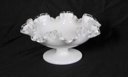 Fenton Basket white footed design 4" High 8"wide clear crystal trimmed. very nice
$42.00
if interested call (614) 274-7786 ask for Regena