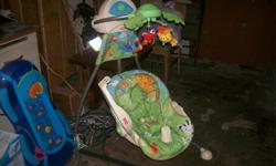Fisher Price Rainforest baby swing, operates from either batteries or plug it in.