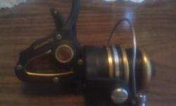 PENN 4300S BLACK AND GOLD SPINNING REEL NEW IN BOX BOUGHT 12 YEARS AGO NEVER USED VERY NICE QUALITY HOLDS 6LB LINE CALL 269-467-8766 I ALSO HAVE A HMG FENWICK MODEL GFS-70 7FT LIGHT ACTION ROD THAT WOULD BE PERFECT FOR THIS REEL FOR 50.00 ALSO VERY HIGH