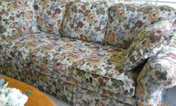 Pastel flowered sofa and maroon arm chair with matching ottoman. Like new condition. Will sell separately or together. Sofa $100, Arm chair with ottoman $50