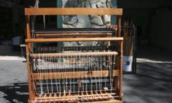 Macomber Ad-A-Harness, Model B5, Serial #5890 floor loom which is in excellent condition.
It is 48", 12 Treds, and 8 Harness.
Also included with the loom are boat shuttles, heddles, warping reel, warping frame, stainless steel reed, and several books.