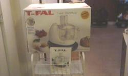 T Fal food processor used very little in box .