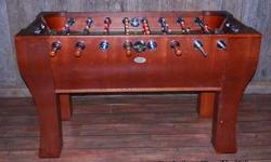 Love playing Foosball? We have a SPECIAL EDITION $900.00 priced to sell FAST AT only $300.00! This table is high quality furniture style with egg and dart molding and wood cabinet and steel rods. For questions, HAS NOT BEEN USED. 417.312.4305.