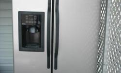 HOTPOINT REFRIGERATOR. USED 2YRS. COST NEW $2000.00. MOVED INTO A DUPLEX AND REFIRGERATOR TO LARGE. 26.9 CUBIC FT. LOOKS BRAND NEW. A STEAL FOR SOMEONE NEEDING A REFRIGERATOR.