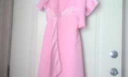 Pink formal knee length dress with purse & sash. Size 4. Dress only wore once. Purse & sash never used. In perfect condition.
