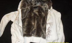 Rue 21.... white and brown.... zipper works and looks like new....small in size