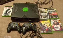 xbox 2 controllers and 5 games