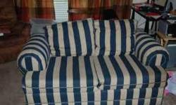 Gently used, striped loveseat for sale. Cushions are removable for easy cleaning.
Please e-mail for more information.