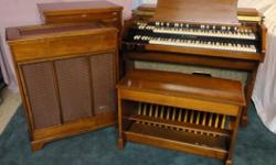 This is a great organ with that great Hammond sound. The model A-105 is basically the same as a B3/C3. Same guts, same sound, but more. The A-105 has the same cabinet as a C3, but contains Hammond's internal speakers and reverb.
This organ was made in