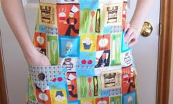 I have many cute aprons for sale. They are full butcher aprons for adults. This butcher style apron is made from 100% cotton fabric. The pocket is easily accessible and roomy. The apron is one size fits most. It is 35" wide at the hem. It is 33" long.