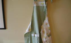 Handmade apron - beautiful stitching, fully reversible.
aqua with coordinating print #02118
brown leaf print with matching reverse print #02112
pale blue w/coordinating print #02116
GREAT MOTHER'S DAY GIFT FOR MOM OR GRANDMA. SHE'LL REMEMBER YOU EVERY