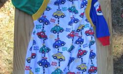 Adorable Healthtex boys creeper with cars sprinkled all over it. This is in fantastic condition and is a size 6-9 months.
