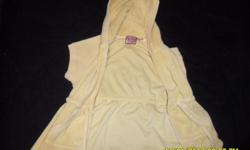 Juicy Coutoure hooded vest.....Yellow hooded vest with working zipper and drawstring.... Small in size