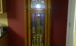Beautiful Howard Miller Grandfather Clock for sale. It is the Filmour model from the Broadmour Collection, Model #610-907. Retails for $5,0390.00, but only asking $3,200.00, obo. Look at it on