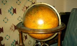 Brought home in the early to mid 60's.
The Globe is in great condition. The floor stand has been taken care of by lemon oil on the wood. The metal has shown age but was never cleaned. The Map it self is good, there are manufactures hollograms on it. there