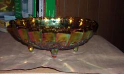 Beautiful Indiana Glass carnival glass footed fruit/console bowl in fantastic condition. I believe this is in the Harvest Grape pattern. One very tiny chip on the inside upper edge section. Measures approximately 12 inches long and 4 1/4 inches high.