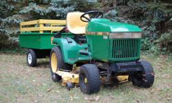 John Deere 265 Garden Tractor { # moo 265A 134200 } with 5 position tilt steering wheel, the 48" mowing deck { with new belts and blades } and the dedicated JD mulching kit. This 630 pound beast is powered by a powerful and smooth running Kawasaki FC 540v