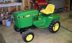 1988 John Deere 318 Garden Tractor, 835 Hrs., Good Condition, Full Maintainance Record, 50" Mower Deck, 54" Hydraulic Lift/Angle Plow, 46" Snow Thrower, Tires Loaded, Chains, New Paint.