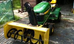 John Deere X300, 125 Total Hours with 44" Snowblower attachment, 42" Law Deck, John Deere Fertilizer attachment, law sweeper, 4 individual John Deere removable weights for traction, tire chains - Tractor has 125 Total Hours - I paid over $6,000.00 in 2008