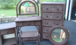 5 piece wicker dresser, vanity with chair, mirror and night stand. I spray painted it brown, so you can always paint it a different color.