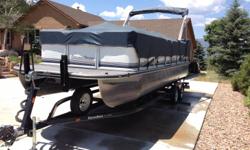 Beautiful 24' pontoon boat. Single owner purchased new in 2004. Stored inside all years. Great condition! Great floating party barge for family and friends (capacity 14 passengers). Awesome&nbsp;for waterskiing, powerfully pulling 1 slalom