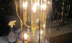 THIS IS A BEAUTIFUL POLISHED BRASS AND GLASS SWAG LIGHT FIXTURE. IT MEASURES 32 1/2 INCHES HIGH. THIS PIECE DOES WORK. IT HAS A DOOR ON THE SIDE SO THE BULBS CAN BE CHANGED AS NEEDED. THIS HAS A DOUBLE ROW OF 4 LIGHTS, SO A TOTAL OF 8 BULBS. WE ARE ASKING