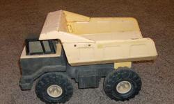 This is a Tonka truck in good shape. 17" long by 10" high