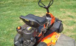 Ariens Lawn Tractor, 24" cut; pull start Tecumseh (B&S) 4 cycle engine w/ grass catcher.