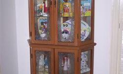 Lighted Curio Cabinet; 4 doors, 5 glass shelves, mirrored back, 76-1/4 tall, 9" deep, 21-1/2" wide at front, 33" wide at back
Contents Not Included. $225 / OBO
