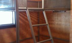 Full size loft bed (silver/gray) tubular metal frame (with rails and ladder - no mattress). We had it in a room with 8 ft. ceilings and our 12 year old had a comfortable amount of head room; however, the legs can be reduced to allow for more. This bed is