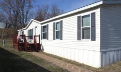 Beautiful manufactured home in Erlanger KY. It is an upgraded home with master suite. The master has a walk in closet and master bath with garden tub and separate shower. The home has an open floor plan with living room and family room open to a large eat
