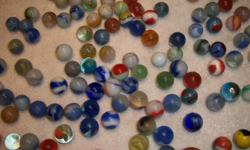 Over 150 Marbles some are very old very unique in color and sizes