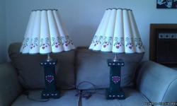 Matching lamps. Wood base with floral design.