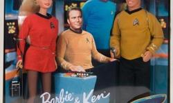 &nbsp;
Engineering Officer Barbie and Command Officer Ken are aboard the USS Enterprise NCC-1701 to commemorate the 30th anniversary of Star Trek.&nbsp; Captain Kirk and Mr. Spock are pictured on the box.
&nbsp;The dolls are made of vinyl and stand