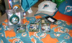 TO ALL MIAMI FANS THIS IS A MUST BUY .. 35.00 for everything
1. frozen mug brand new
2. NOW u can wave your MIAMI Dolphins flag (window flag)
3. 2 brand new NFL MIAMI DOLPHINs caps never been worn
4. zippo lighter SOLD
5. boxers / bed time sleep never
